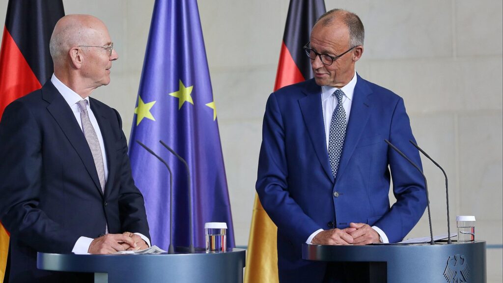 Martin Blessing und Friedrich Merz am 22.09.2025