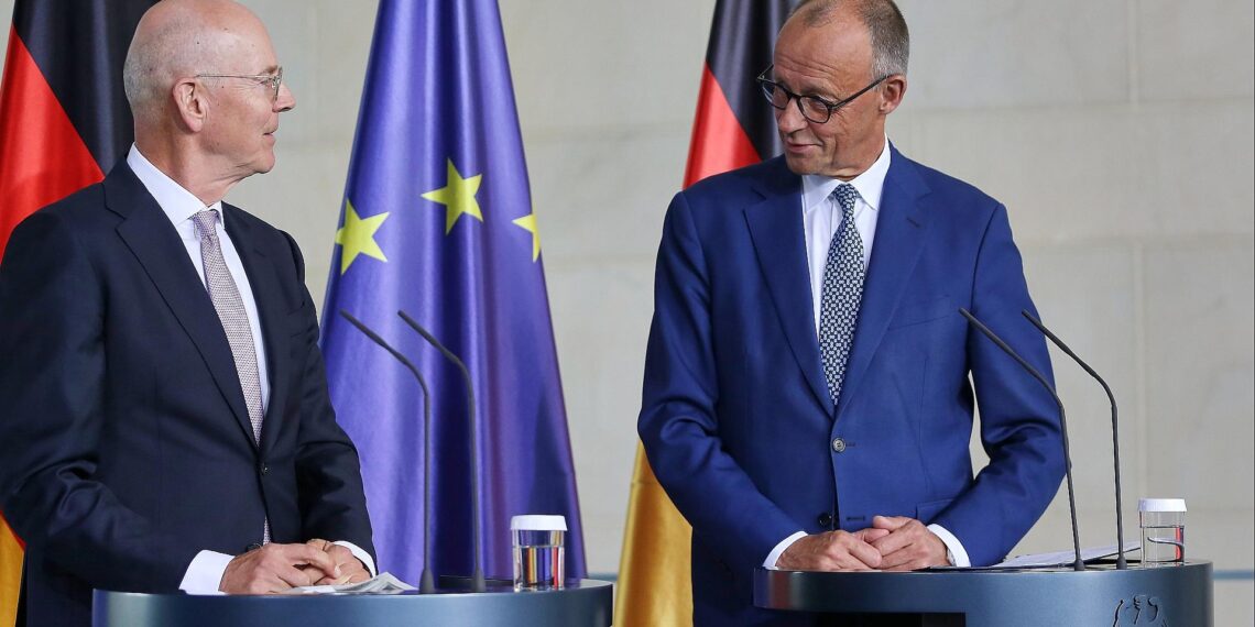 Martin Blessing und Friedrich Merz am 22.09.2025