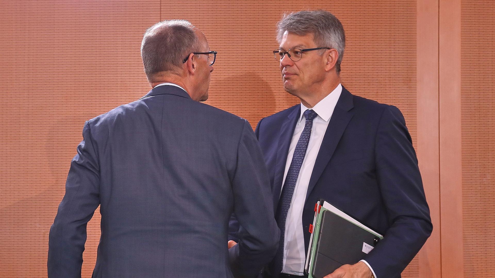 Friedrich Merz und Patrick Schnieder (Archiv)